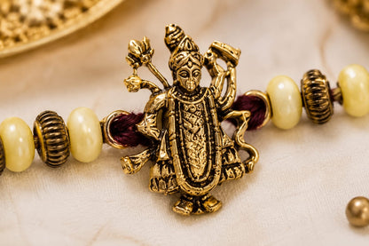 Maa Durga Rakhi Antique Gold Finish Beaded Rakhi Maroon Thread